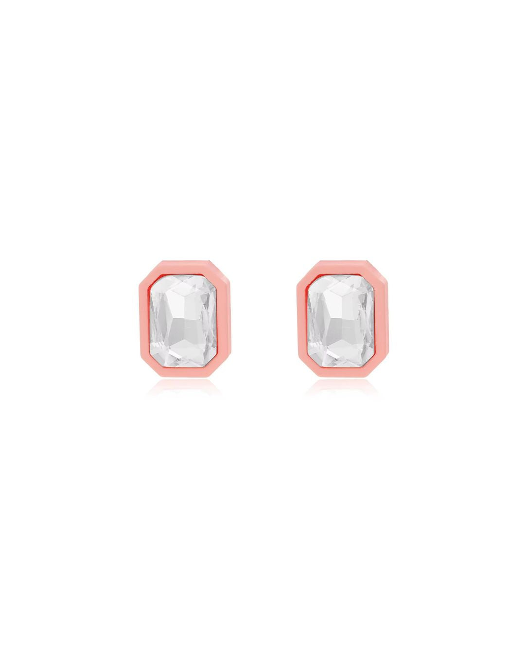 Pair of earrings with rose gold frames and clear gemstones on a white background