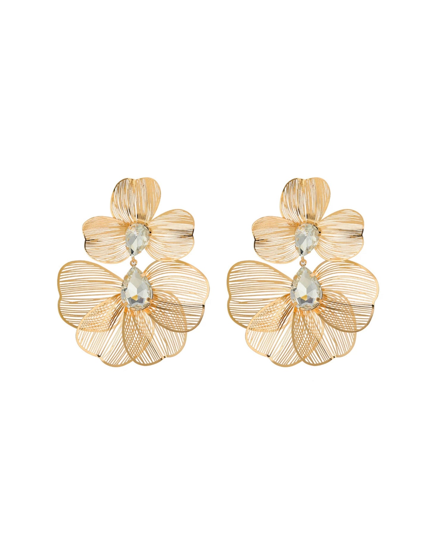 Gold floral earrings with clear gemstones on a white background