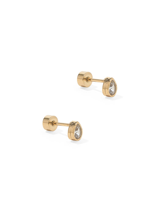 A pair of gold-colored screwback stud earrings with pear-shaped clear stones set in gold bezels.