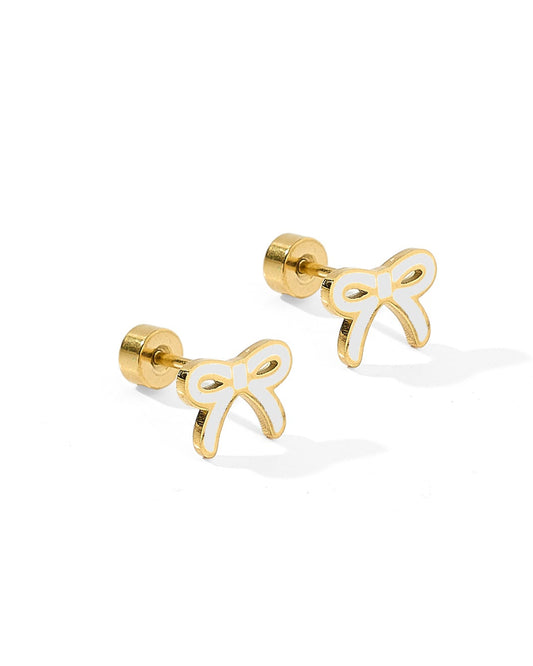 Gold and white bow-shaped earrings on a white background