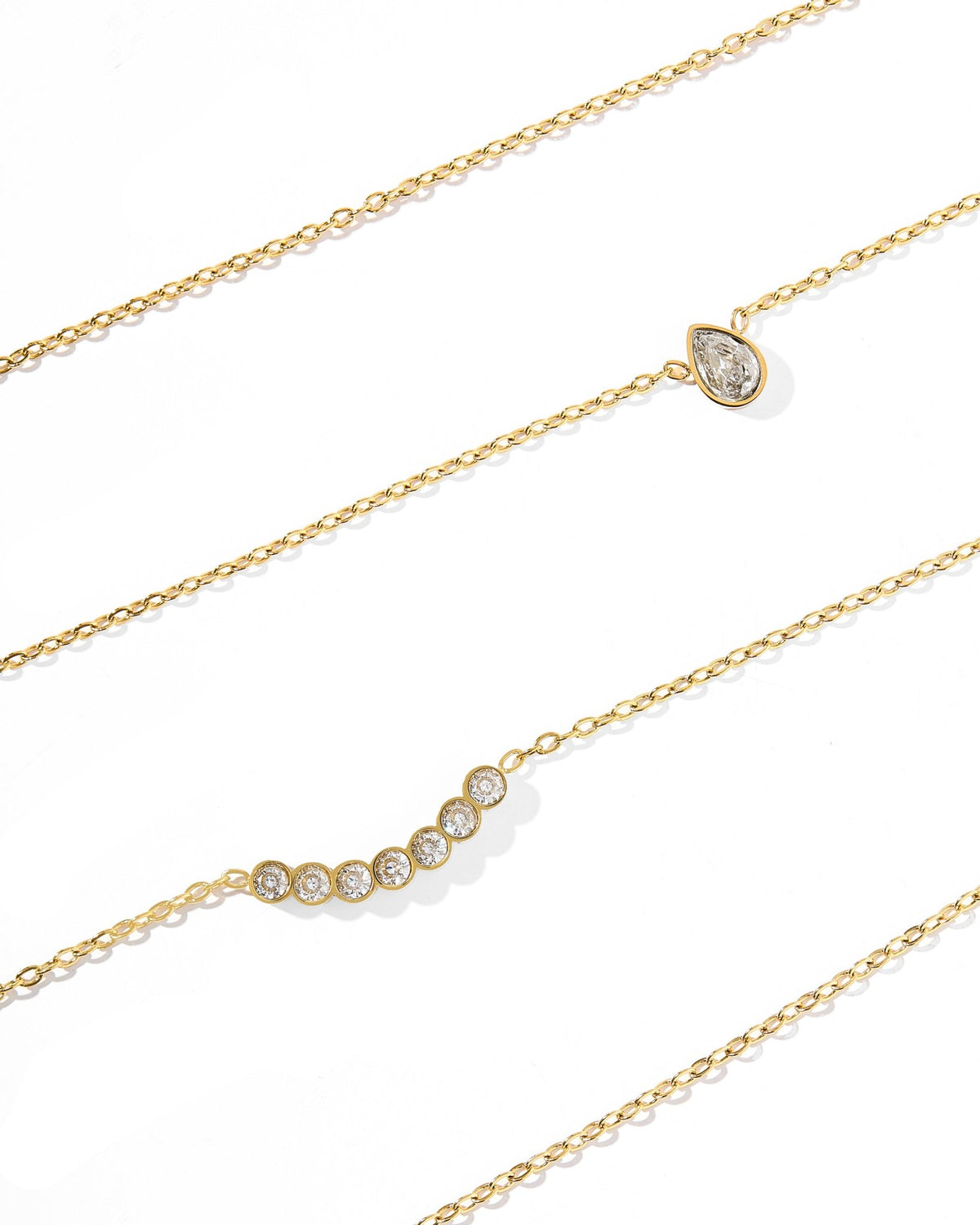 LINNY CO Paloma Pear Drop Gold necklace for kids & little girls — hypoallergenic, waterproof stainless steel, flat-lay styling.