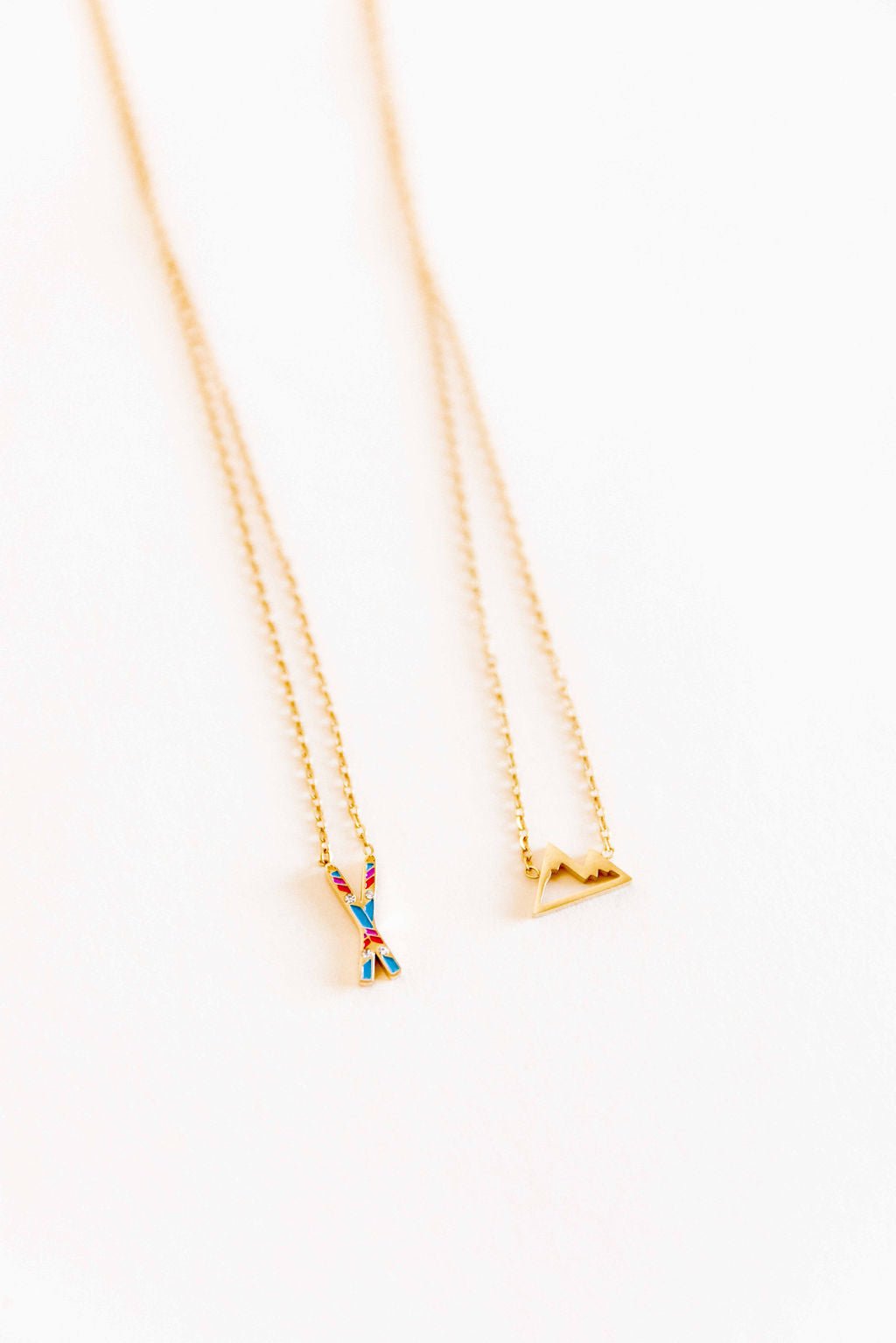 LINNY CO Snow Ski necklace for kids & little girls — hypoallergenic, waterproof stainless steel, flat-lay styling.