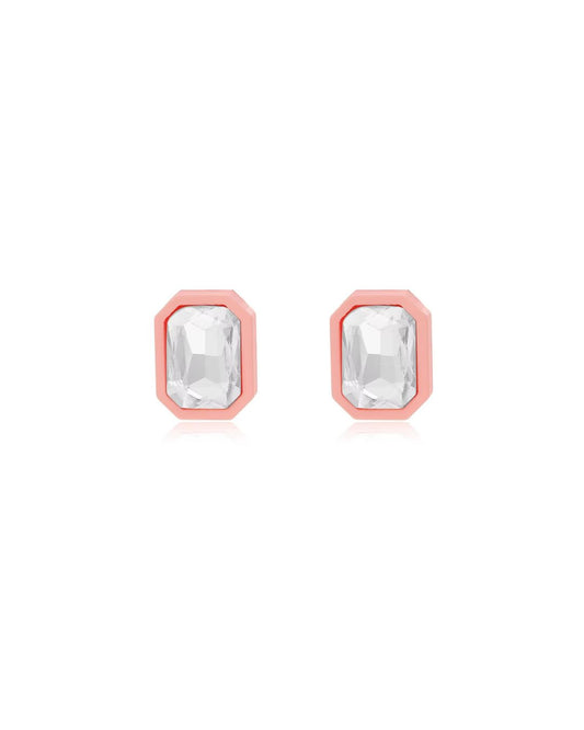 Pair of earrings with rose gold frames and clear gemstones on a white background