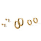 Set of gold hoop earrings on a white background