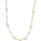 Pearl necklace with gold chain on a white background