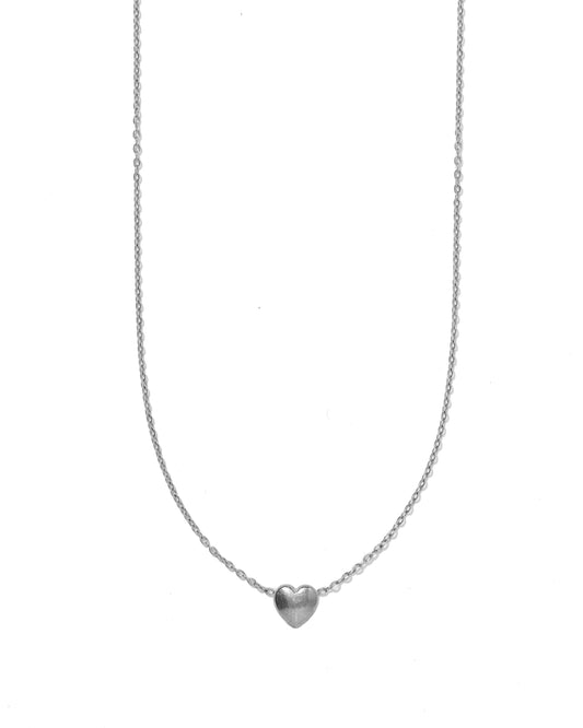 Silver heart-shaped pendant necklace on a white background