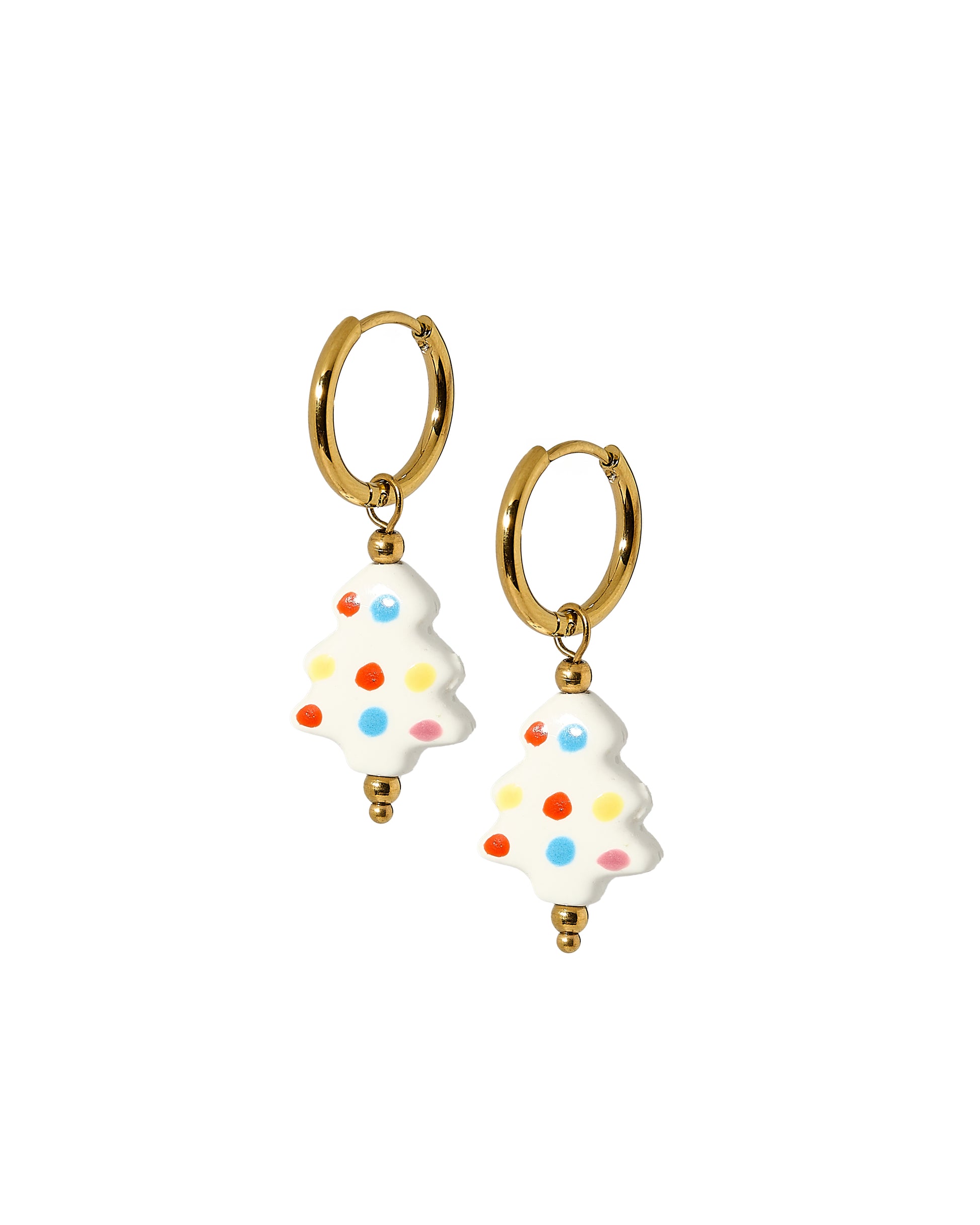 Gold hoop earrings with white tree-shaped charms featuring colorful dots on a white background