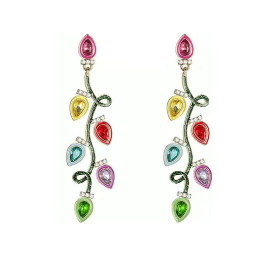Multicolored teardrop christmas light earrings on a white background