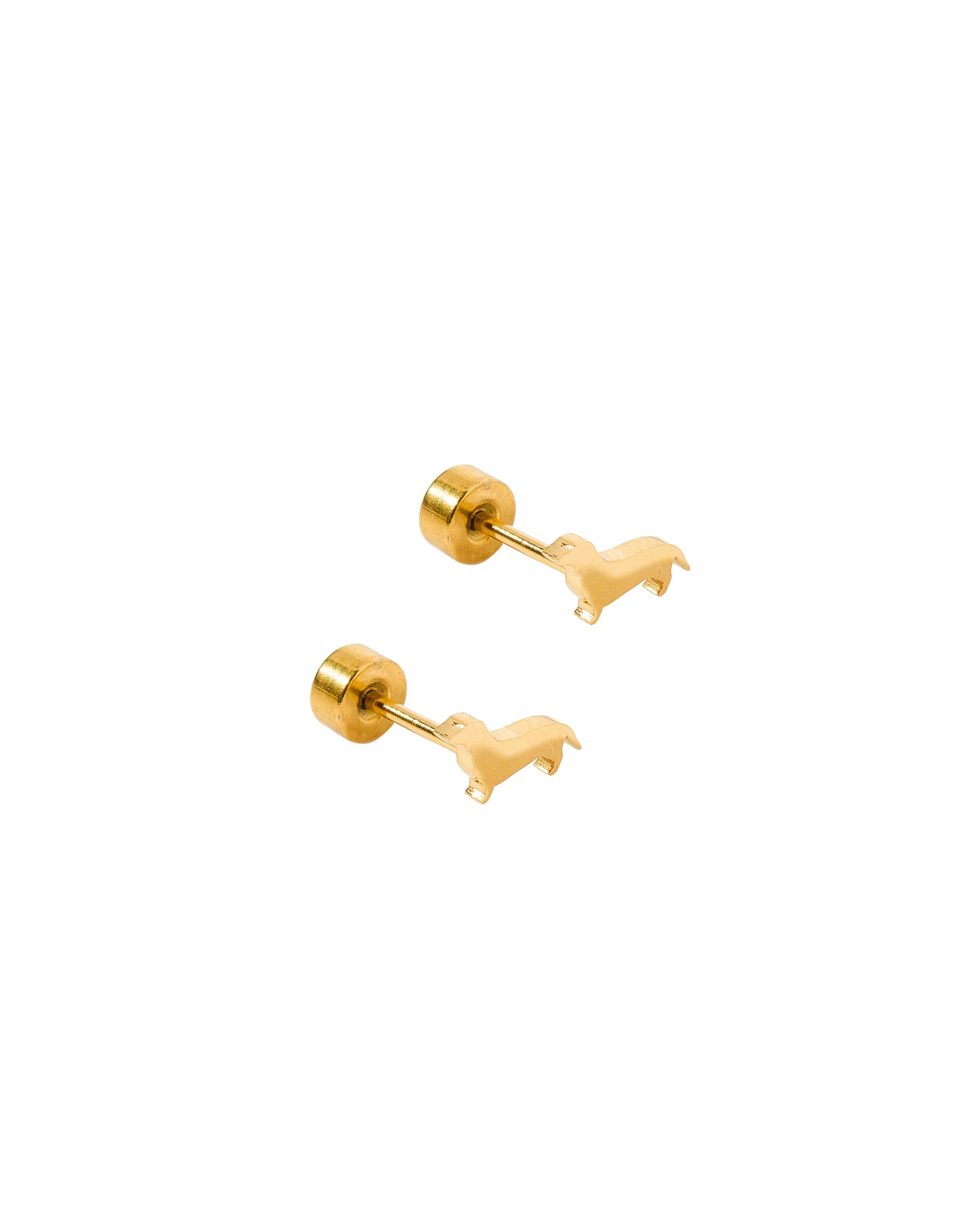 Gold dog-shaped earrings on a white background