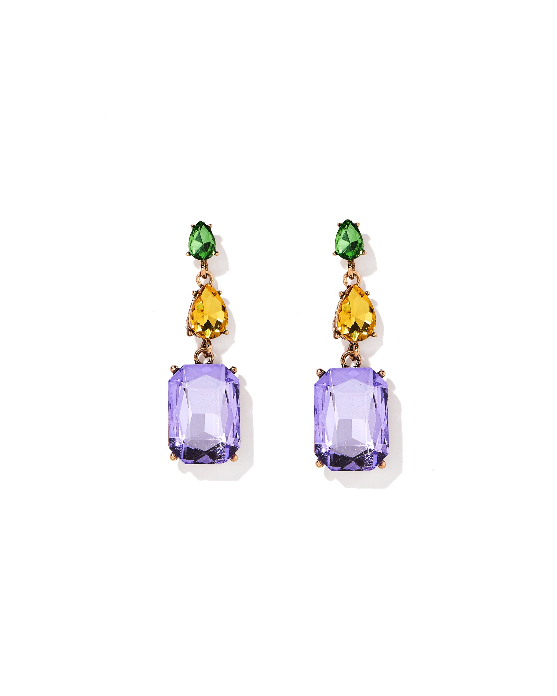 Pair of earrings with purple gemstones and green and yellow accents on a white background