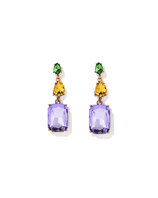Pair of earrings with purple gemstones and green and yellow accents on a white background