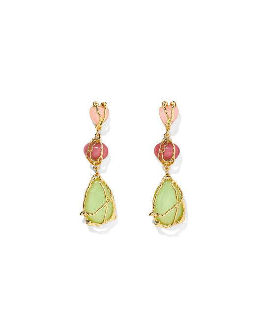 Pair of earrings with green and pink stones on a white background