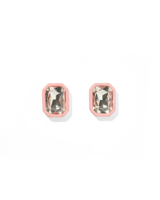 Pair of earrings with pink and clear gemstones on a white background