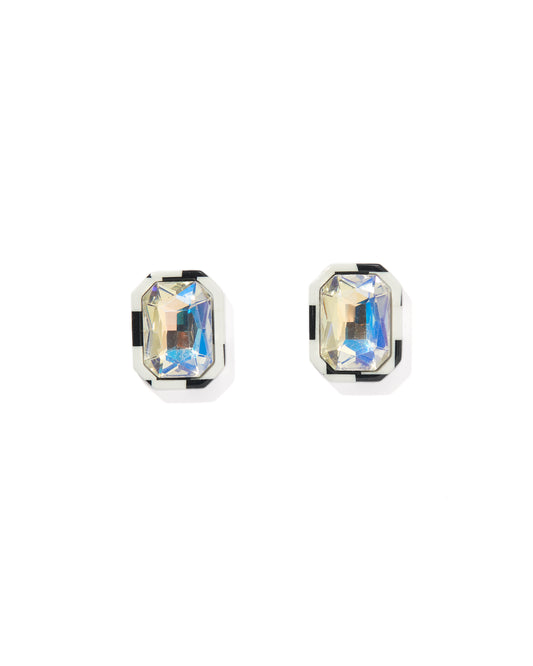 Pair of stud earrings with rectangular gemstones on a white background
