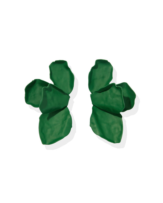Pair of green earrings on a white background