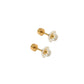 Pair of gold and white floral earrings on a white background