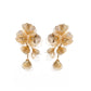Pair of gold floral earrings on a white background