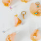 Huggie Charm Earrings - Lock and Key Gold - LINNY CO WholesaleMetals