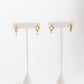 LINNY CO Celine Gold huggie earrings for kids & little girls — hypoallergenic, waterproof stainless steel, detail.