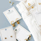 LINNY CO Dakota Heart huggie earrings for kids & little girls — hypoallergenic, waterproof stainless steel, flat-lay styling.