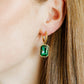 LINNY CO Diana Green huggie earrings for kids & little girls — hypoallergenic, waterproof stainless steel, shown on model.