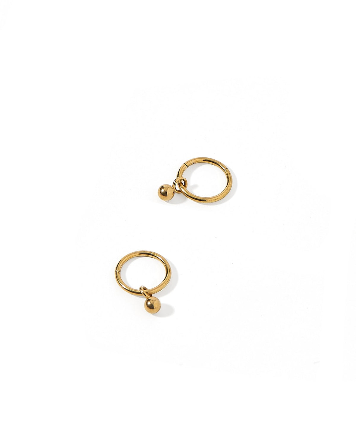 LINNY CO Nola 10mm huggie earrings for kids & little girls — hypoallergenic, waterproof stainless steel, detail.