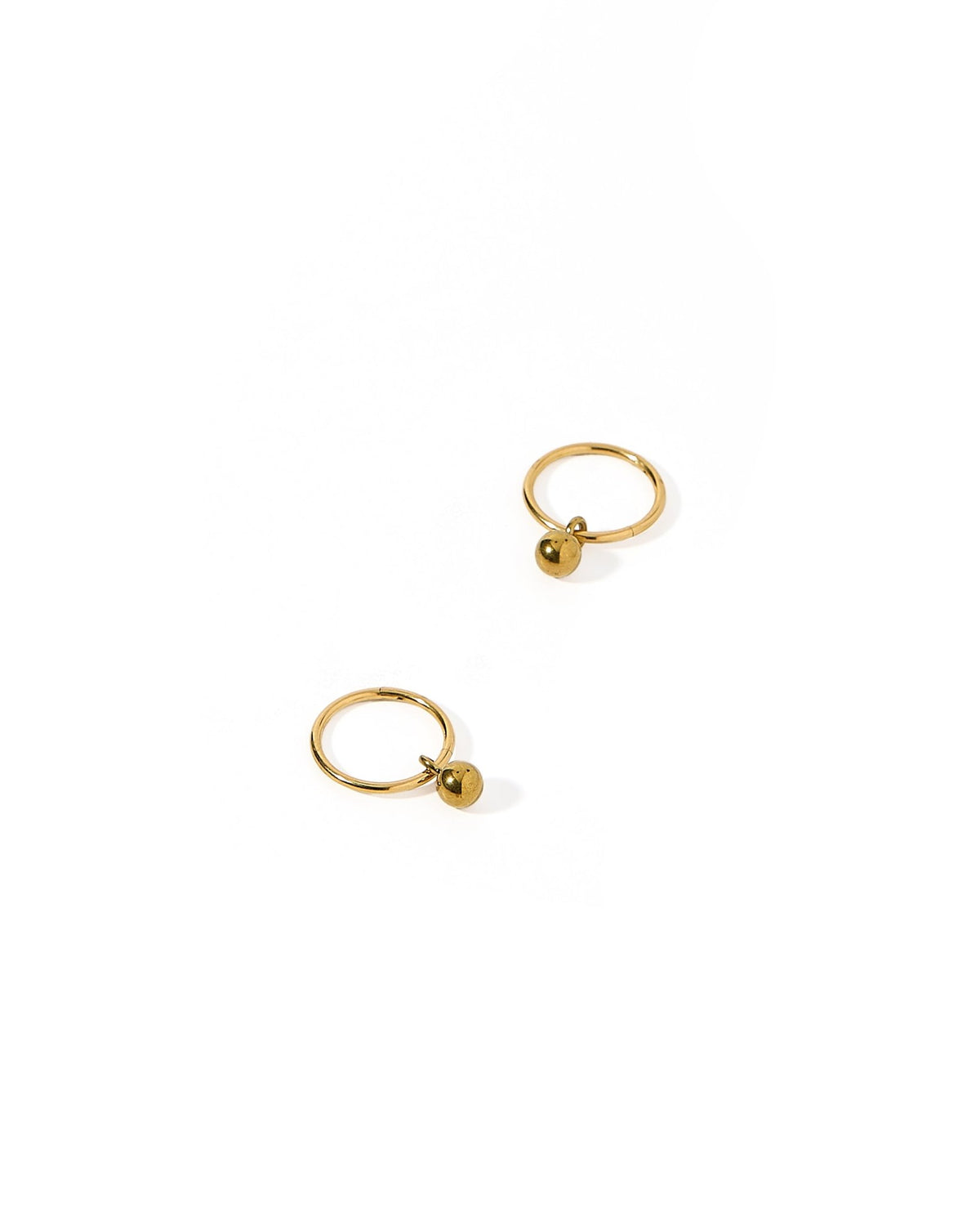 LINNY CO Nola 8mm huggie earrings for kids & little girls — hypoallergenic, waterproof stainless steel, detail.