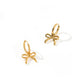 LINNY CO Sadie Bow Gold huggie earrings for kids & little girls — hypoallergenic, waterproof stainless steel, detail.