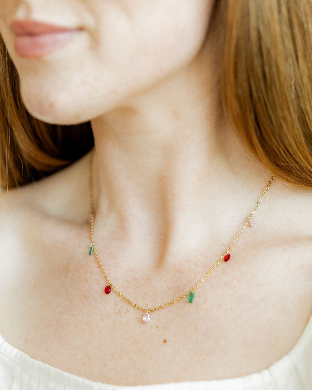 LINNY CO Allegra Holiday necklace for kids & little girls — hypoallergenic, waterproof stainless steel, shown on model.