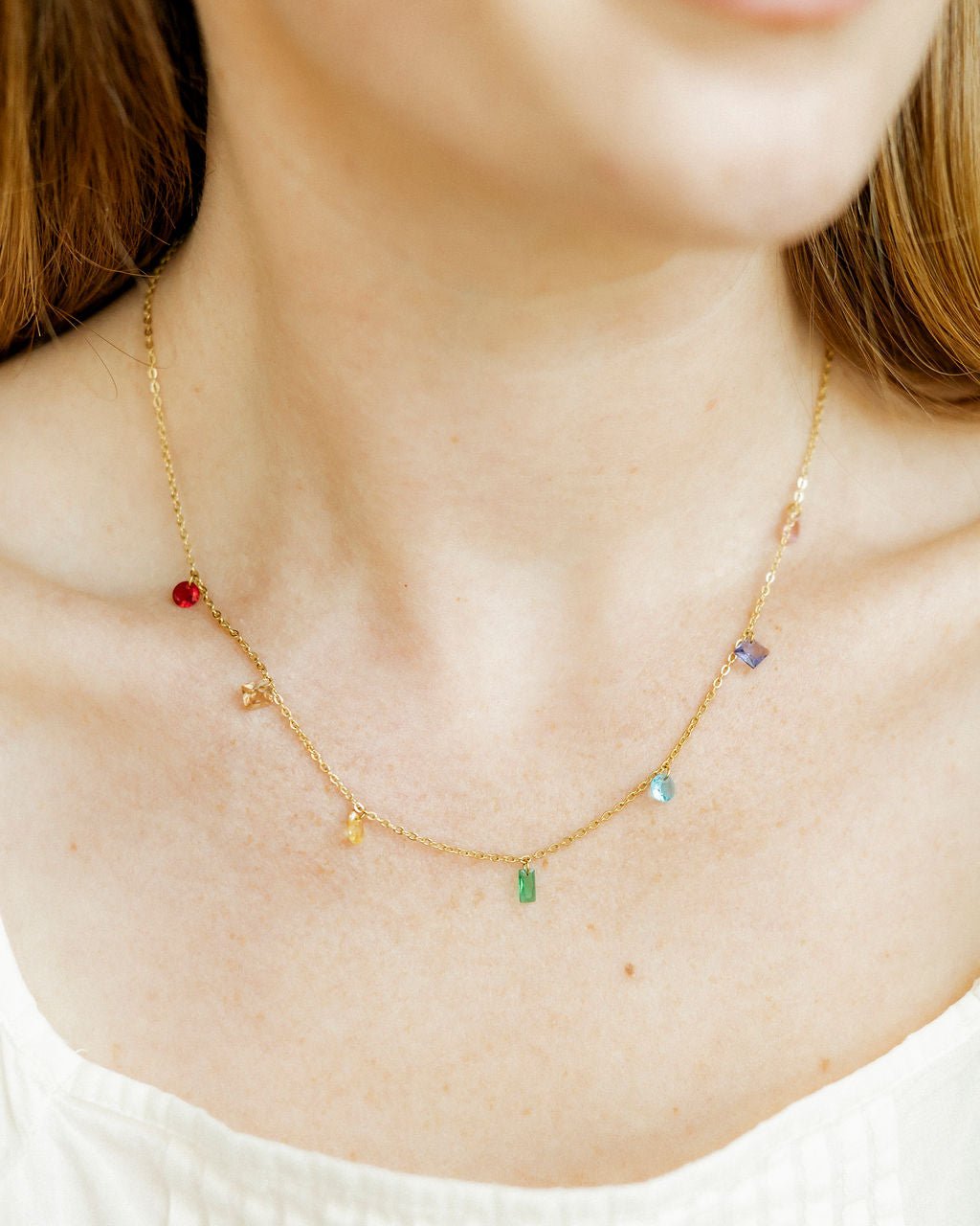 LINNY CO Allegra Multi necklace for kids & little girls — hypoallergenic, waterproof stainless steel, shown on model.