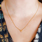LINNY CO Bella Butterfly necklace for kids & little girls — hypoallergenic, waterproof stainless steel, shown on model.