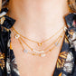 LINNY CO Bella Butterfly necklace for kids & little girls — hypoallergenic, waterproof stainless steel, shown on model.