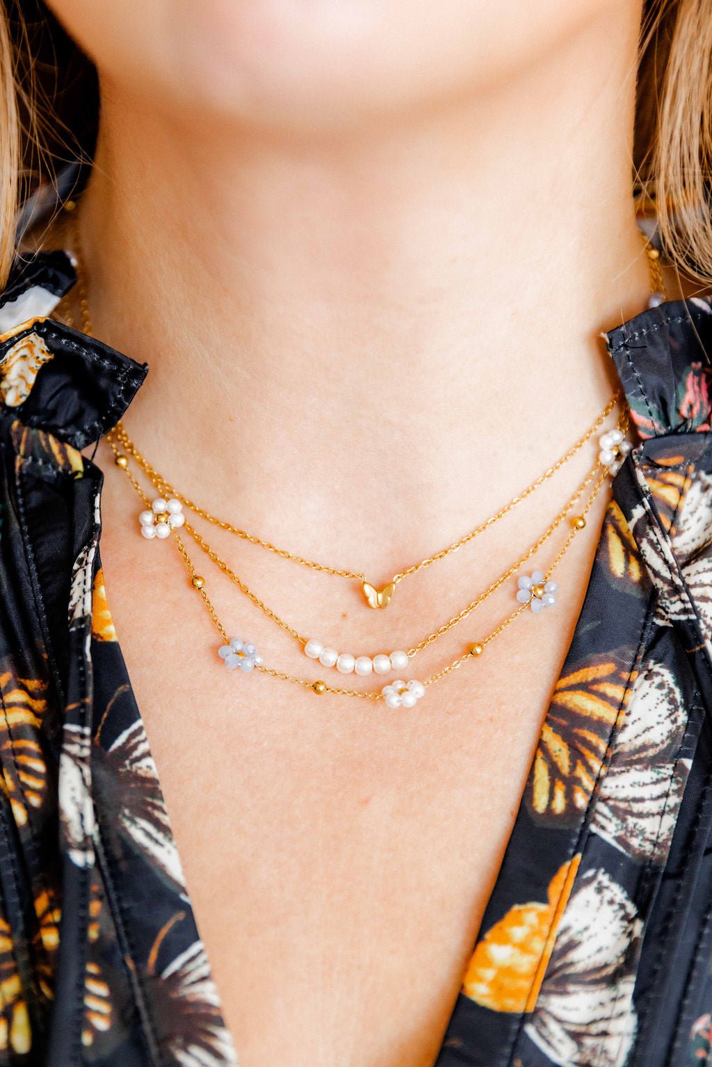 LINNY CO Bella Butterfly necklace for kids & little girls — hypoallergenic, waterproof stainless steel, shown on model.