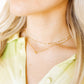LINNY CO Bella Butterfly necklace for kids & little girls — hypoallergenic, waterproof stainless steel, shown on model.