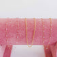 LINNY CO Dabney Pink necklace for kids & little girls — hypoallergenic, waterproof stainless steel, flat-lay styling.