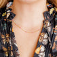 LINNY CO Dabney Pink necklace for kids & little girls — hypoallergenic, waterproof stainless steel, shown on model.