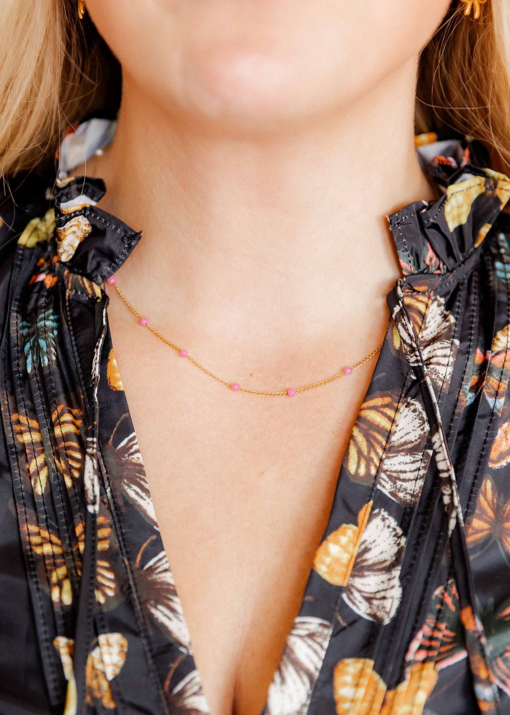 LINNY CO Dabney Pink necklace for kids & little girls — hypoallergenic, waterproof stainless steel, shown on model.