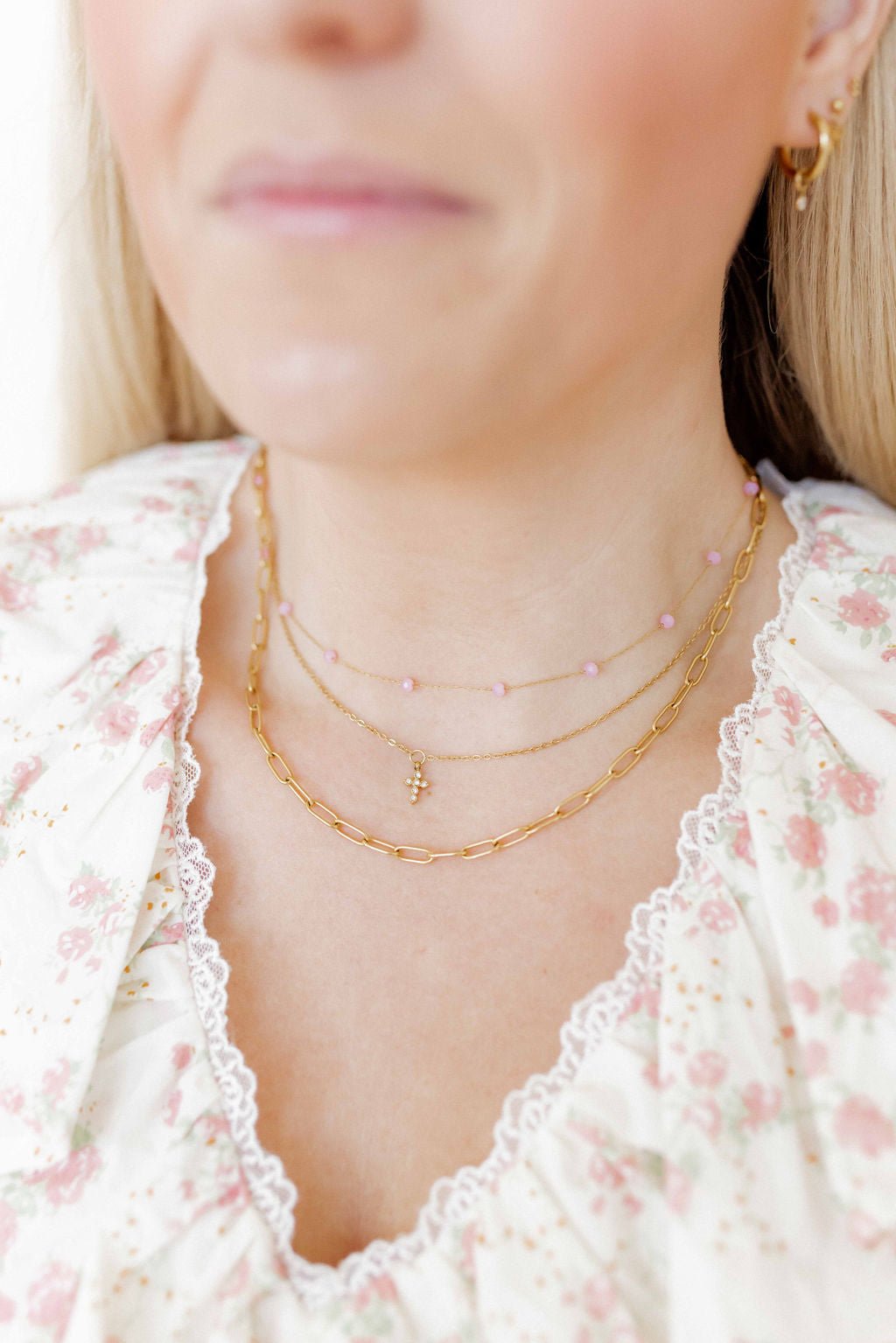 LINNY CO Dabney Pink necklace for kids & little girls — hypoallergenic, waterproof stainless steel, shown on model.