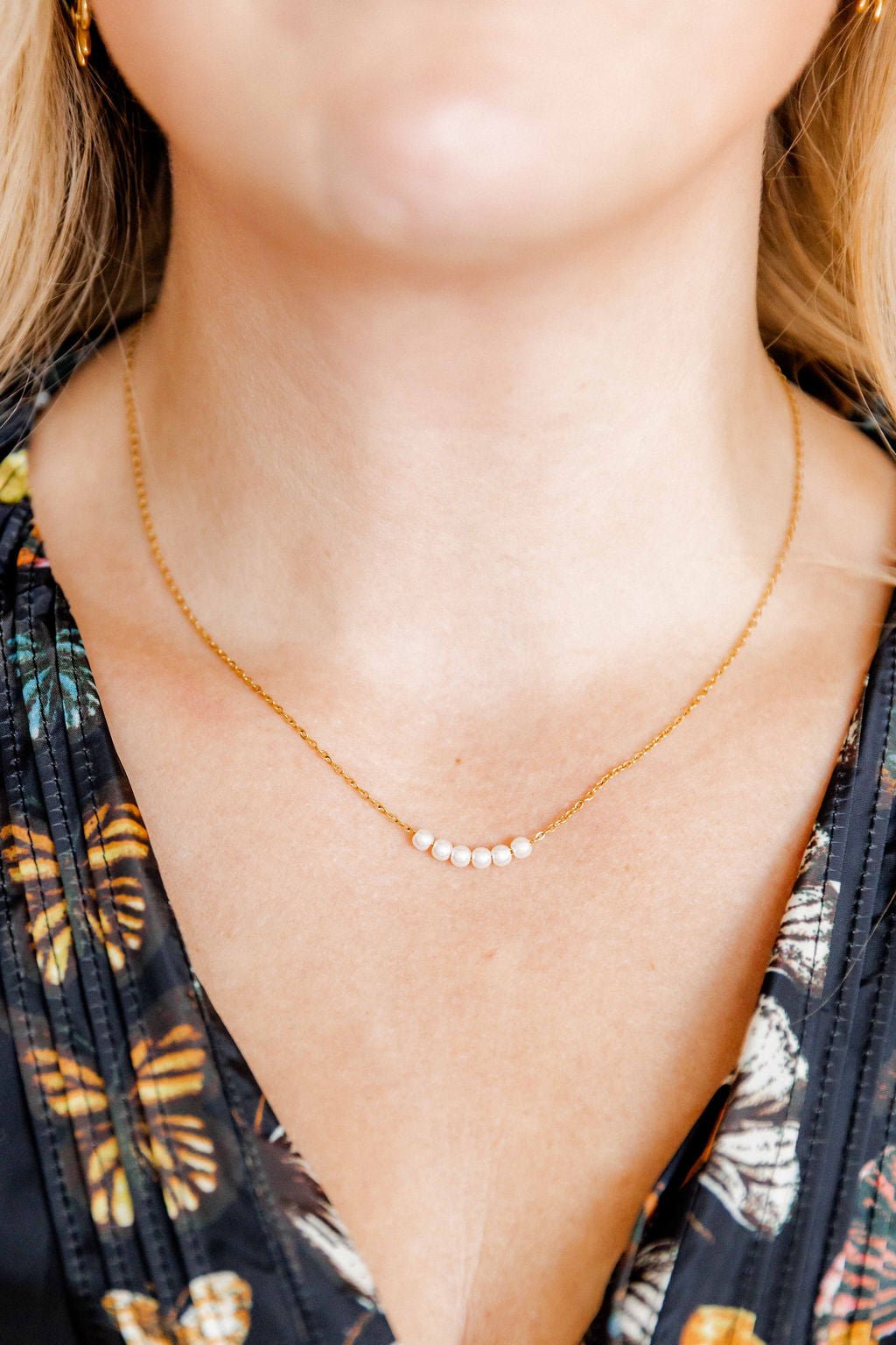 LINNY CO Delta Pearl necklace for kids & little girls — hypoallergenic, waterproof stainless steel, shown on model.
