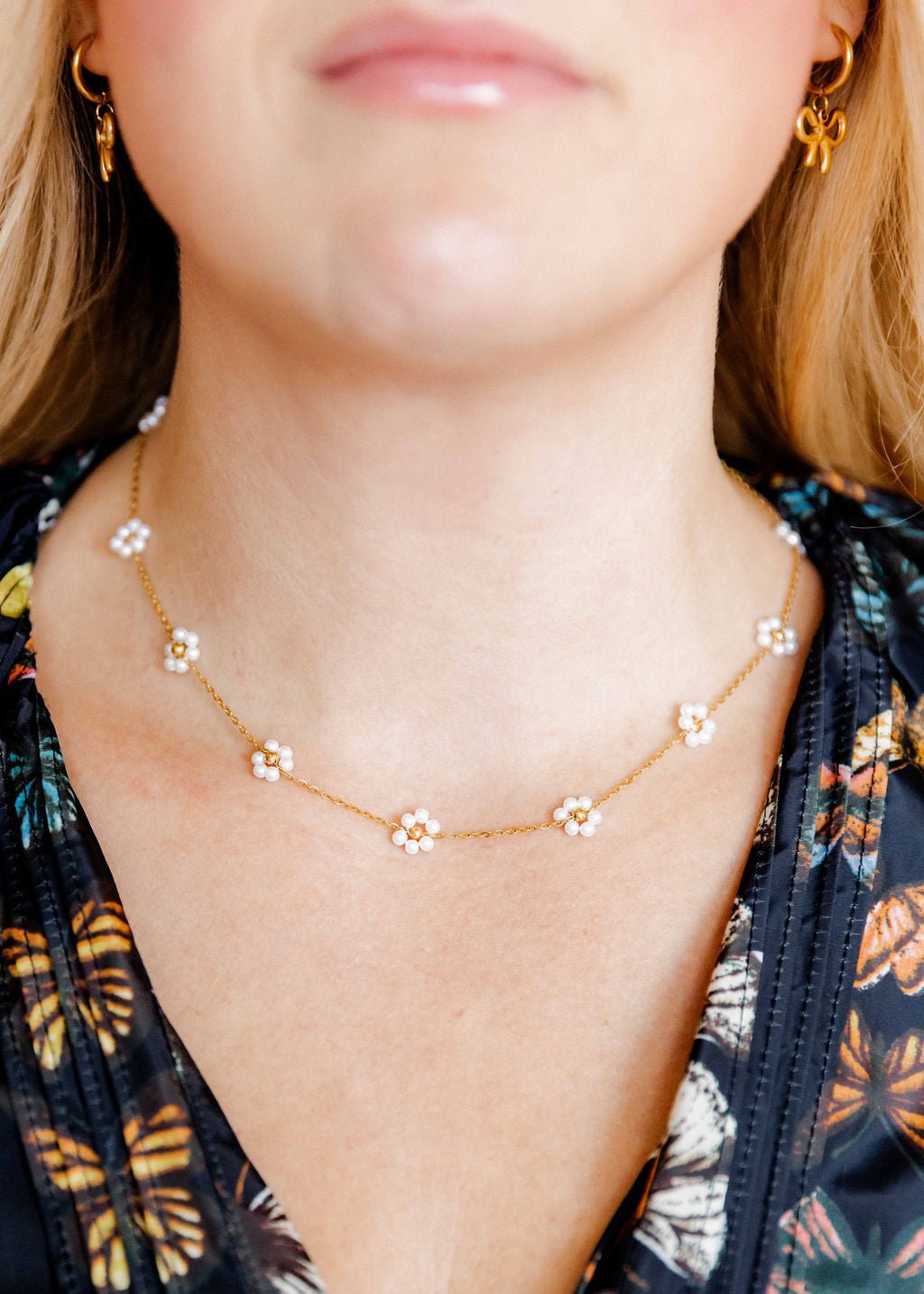 LINNY CO Gracie Flower Pearl necklace for kids & little girls — hypoallergenic, waterproof stainless steel, shown on model.
