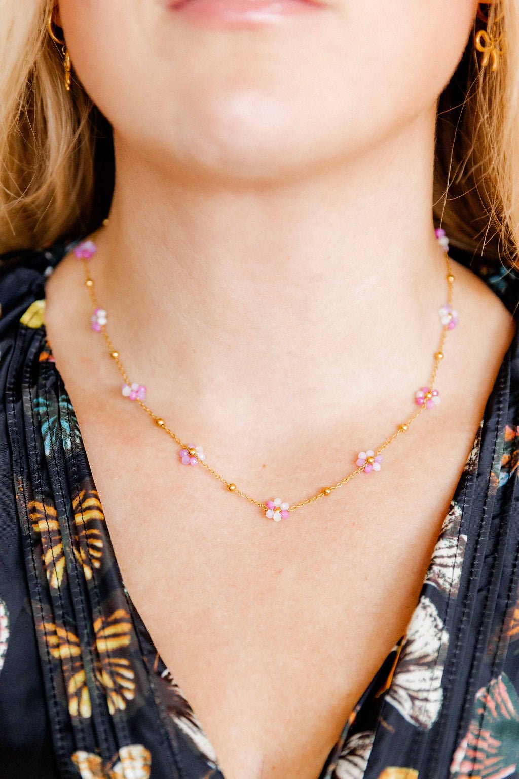 LINNY CO Gracie Flower Pink Multi necklace for kids & little girls — hypoallergenic, waterproof stainless steel, shown on model.