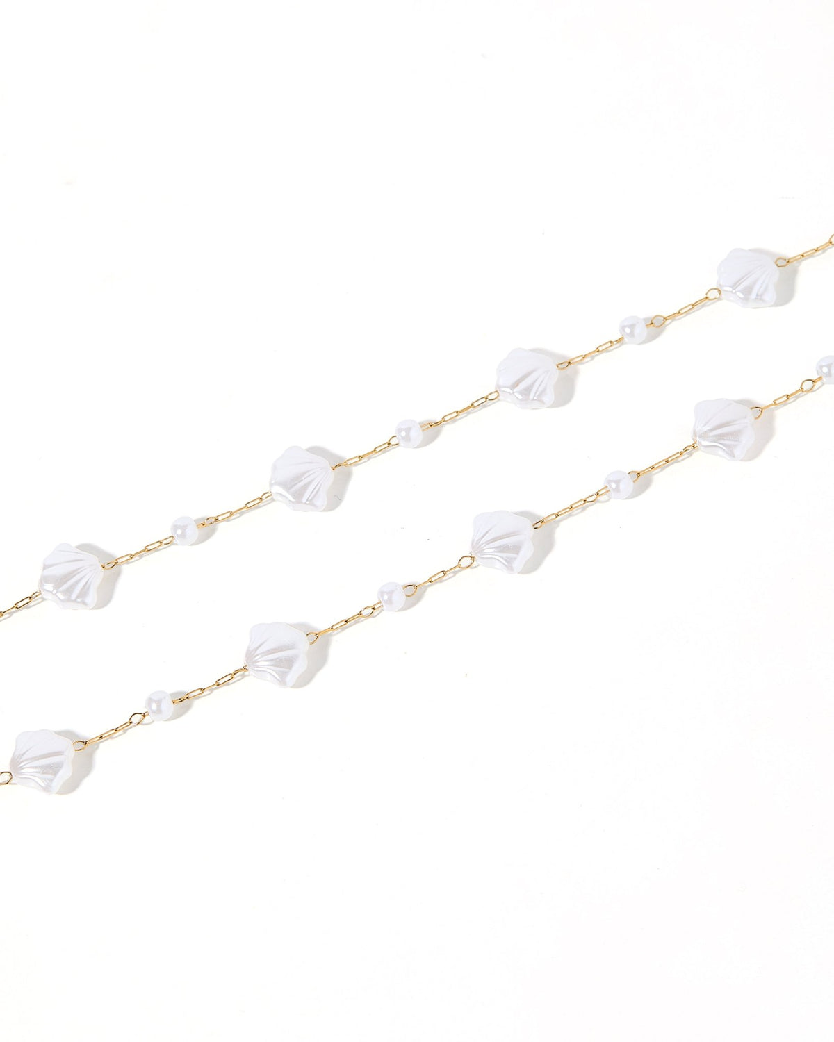 LINNY CO Kai Seashell Pearl necklace for kids & little girls — hypoallergenic, waterproof stainless steel, detail.