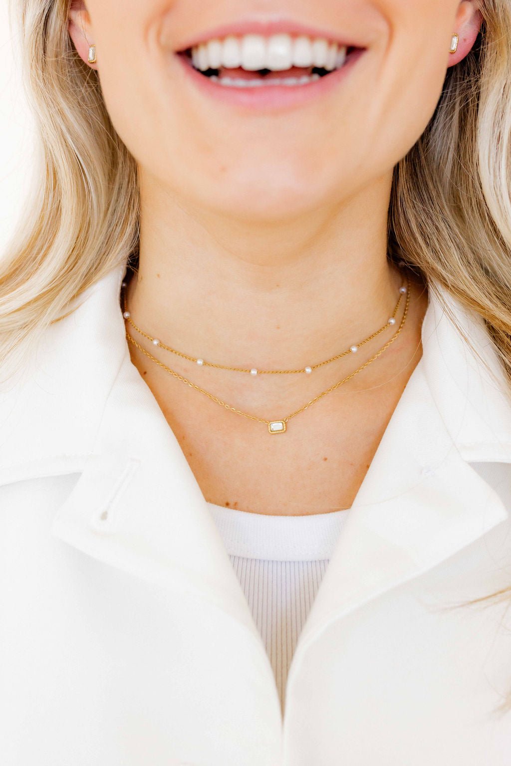 LINNY CO Madison necklace for kids & little girls — hypoallergenic, waterproof stainless steel, shown on model.