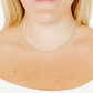 LINNY CO Miles Silver necklace for kids & little girls — hypoallergenic, waterproof stainless steel, shown on model.