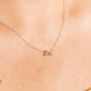 LINNY CO Mountain Silver necklace for kids & little girls — hypoallergenic, waterproof stainless steel, shown on model.