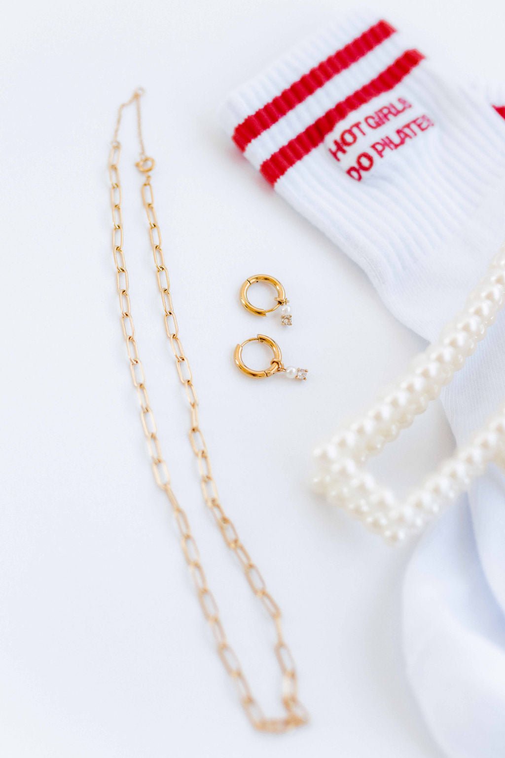 LINNY CO Palmer Paperclip Gold necklace for kids & little girls — hypoallergenic, waterproof stainless steel, flat-lay styling.