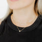 LINNY CO Paloma Pear Drop Gold necklace for kids & little girls — hypoallergenic, waterproof stainless steel, shown on model.