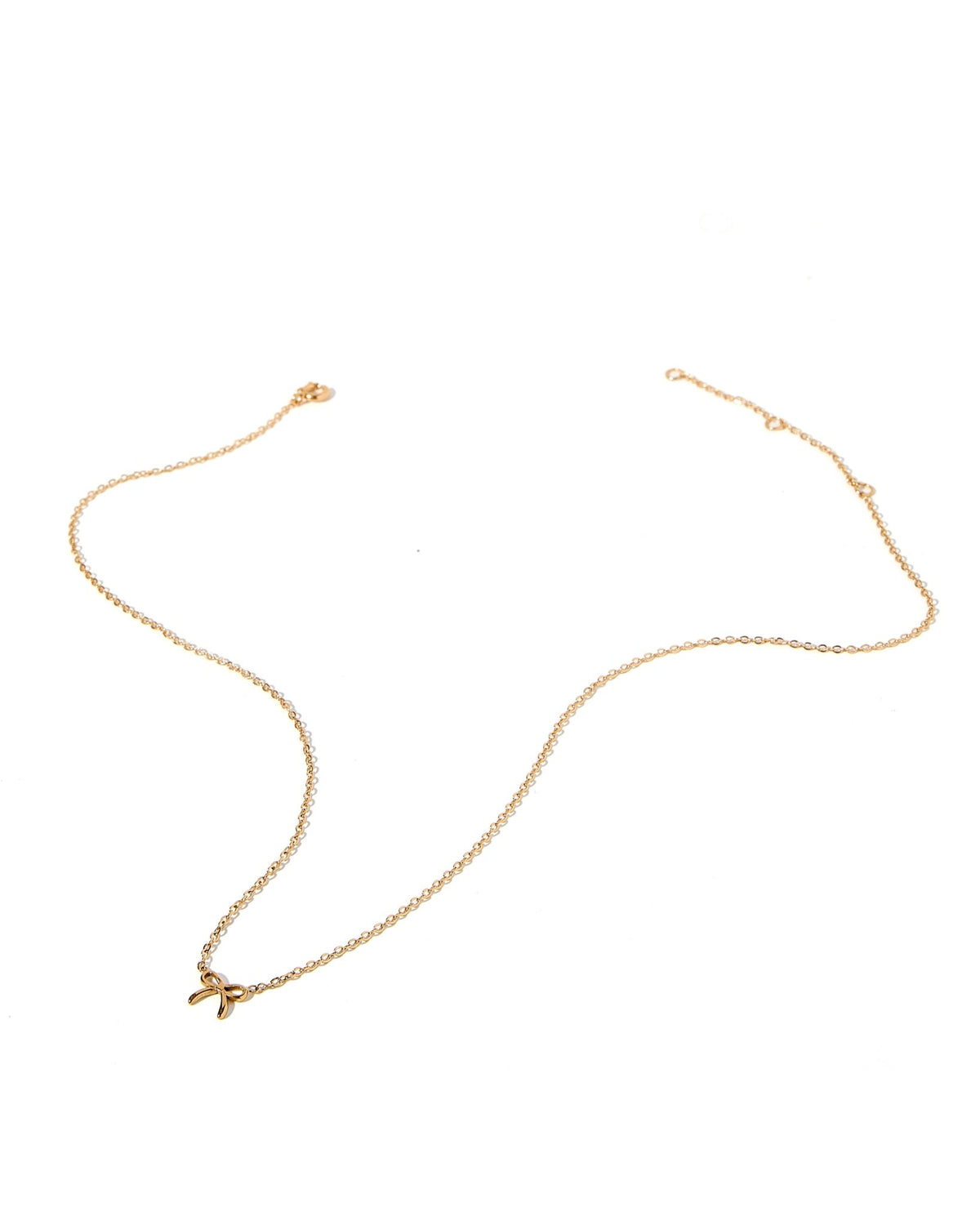 LINNY CO Sadie Bow Gold necklace for kids & little girls — hypoallergenic, waterproof stainless steel, detail.