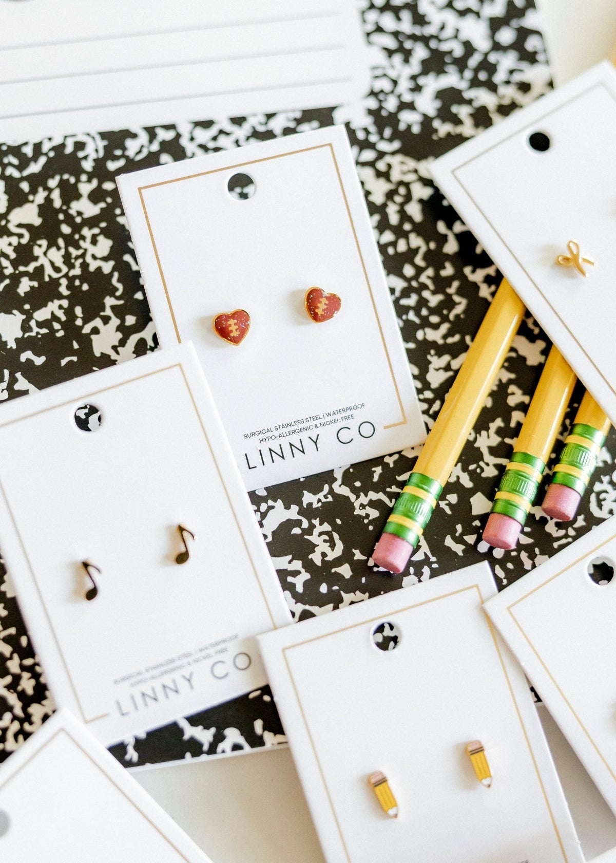 Screwback Stud Earrings - Football Heart - LINNY CO WholesaleStuds
