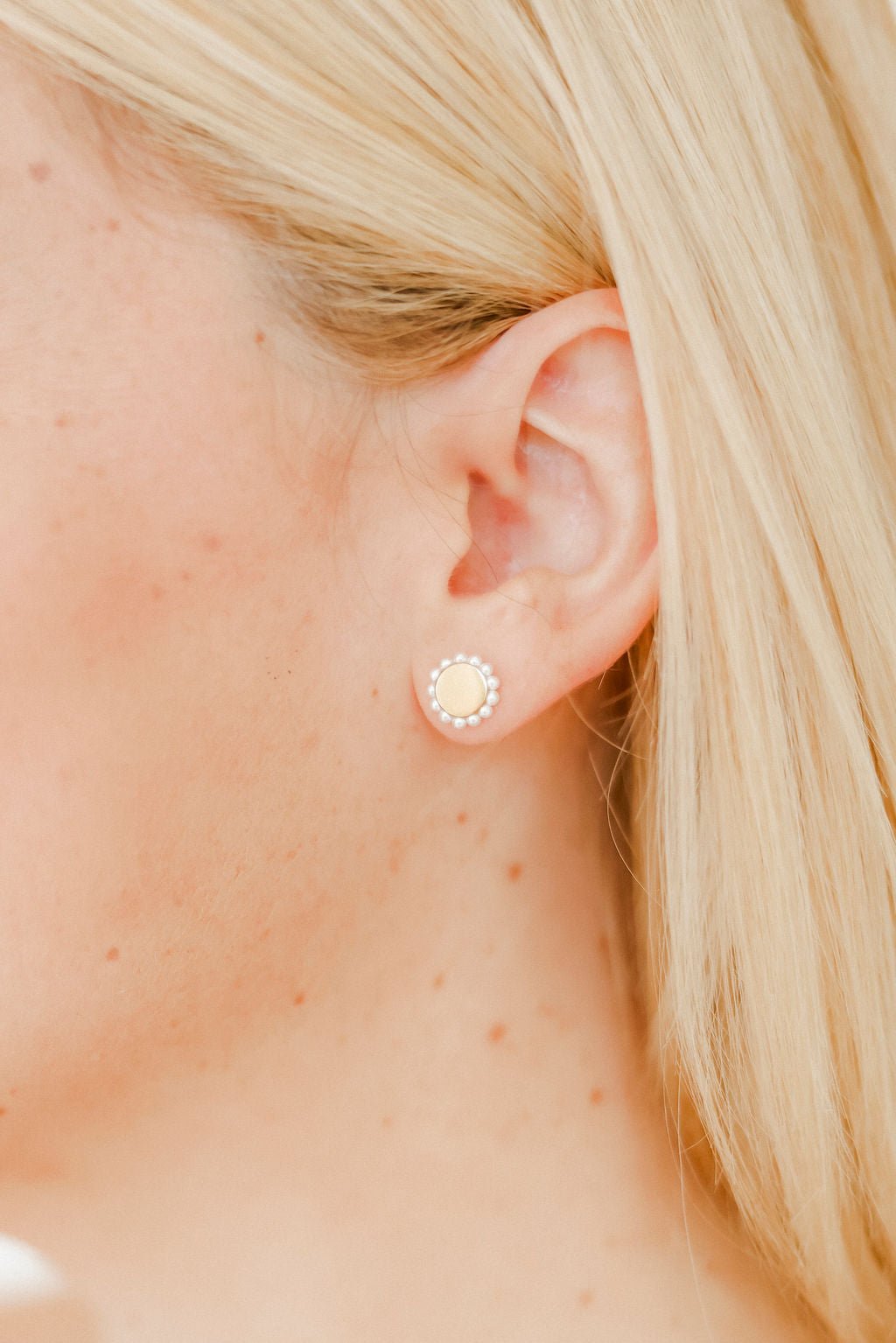 LINNY CO Alice Pearl screwback stud earrings for kids & little girls — hypoallergenic, waterproof stainless steel with secure screwback backs, shown on model.